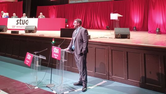 Image:Nautilus strategic organiser Grant Mudie moving Motion 27, 'Vessel replacement on Shetland and Orkney Ferry Routes', which was passed unanimously at STUC Annual Congress 2025.