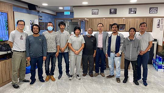 Image:Rescued crew with Merchant Navy Officers’ Guild Hong Kong (MNOG-HK) staff. Image: MNOG-HK