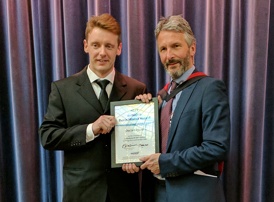 Image:Bevis Minter winner 2017 Declan Fyans presented with his award by Nautilus head of communications Andrew Linington.