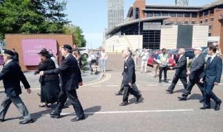 Image:Mariners' Park resident Mike Feltham (middle) during the March for the Medals. Image: Nautilus International