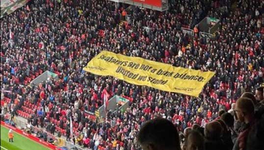 Image:Liverpool FC supporters fly a Nautilus banner in solidarity with sacked P&O Ferries seafarers. Image: Nautilus International