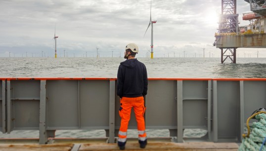 Image:The UK government's Visa waiver programme has allowed companies in the offshore wind sector to hire workers from outside the UK on lower wages. Image: Getty / Charlie Chesvick