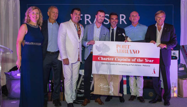 Image:Captains James Griffith and Michael Droszcz accept their award during the Fraser Yachts ceremony.