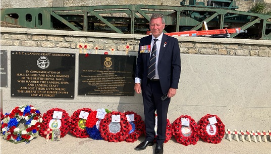 Image:Ian Hunter at the Arromanches memorial, where he laid a wreath in honour of his father Donald Hunter, who during his lifetime fundraised to set up the French memorial as well as a larger monument in the UK. Images: courtesy of Ian Hunter