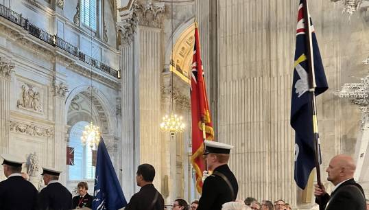 Image:Charlie Schofield, a Nautilus Bevis Minter Award winner in 2021 carries the Merchant Navy standard at the ANSS at St Paul's Cathedral in October 2022, which attracted about 1000 representatives from across maritime. All images: Nautilus International