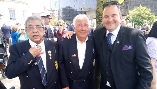 Image:Andrew Jones (right) at Battle of the Atlantic 80th anniversary commemorations . He is pictured with, from left, Stu Attick and Jimmy Allenby (ex Cunard), members of the Liverpool Merchant Navy Association which meets regularly at Mariners' Park. Mr Attick and Mr Allenby laid the wreaths in the BoA80 Drumhead service at the Liverpool's Pier Head before the March of the Medals, also attended by some Park residents. Image: Nautilus International