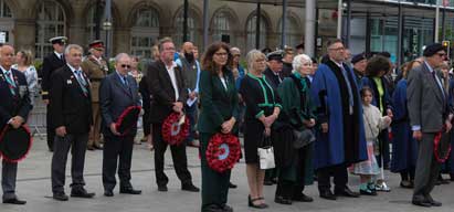 Image:Nautilus staff member John Norris (centre, with white shirt) representing the Union at the Hull Cenotaph Falklands wreath-laying ceremony