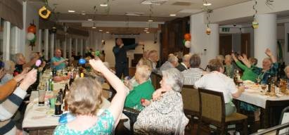 Image:Popular Mariners' Park entertainer Rob Steele leads residents in a St Patrick's Day singalong in March 2023