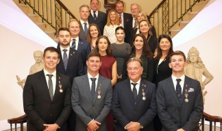Image:Yacht crew Medal recipients (front) with colleagues, family and friends. 