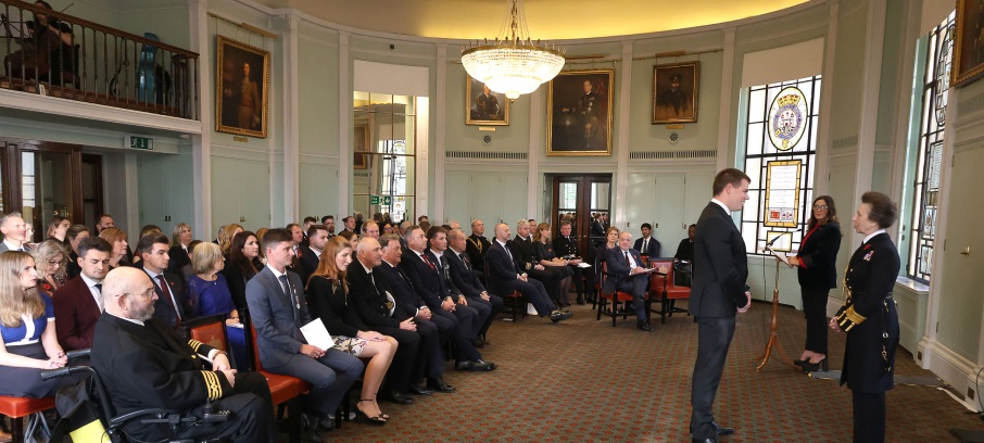 Image:Yacht bosun Ashley West receives his Medal from HRH, The Princess  Royal, watched by other awardees and guests, including maritime minister Mike Kane.