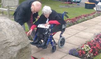 Image:Nautilus Care Home resident Kate Hurley and her son Ian Hurley lay a wreath at the Atlantic Stone.