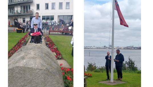 Image:At left: Former Merchant Navy officer Stan McNally, a Nautilus Care Home resident, accompanied by Keith Newey, his son-in-law, lays a wreath at the Atlantic Stone at Mariners' Park in Wallasey, UK. Right: Alex Harrison, a former master mariner, lowered and raised the flag accompanied by head gardener Dave Crawford. Images: Nautilus International except where stated.