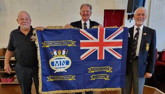 Image:Left to right: Dave Creamer (chairman); Mike Ridehalgh (retired inaugural chairman)
and Nick Taylor (colour master). Image: North Wales MNA
