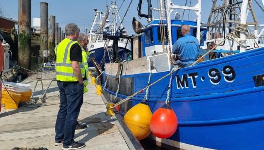 Image:SAIL generalist adviser David Gosney meeting fishermen in Hartlepool. Image: SAIL