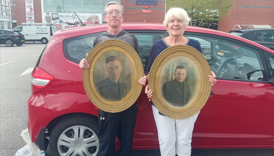 Image:Allen Gibbons and Margaret Farrell with the photos found by Sheila Hurst of Allen's father Peter and his brother George Gibbons.