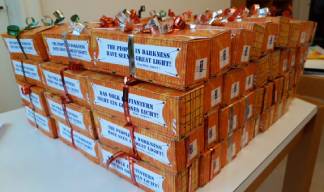 Image:Stacked presents from the German Seamen's Mission  awaiting delivery to crew. Image: Dutch Seafarers' Mission