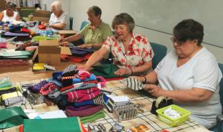 Image:Volunteers hard at work for seafarers. Image: Sailor's Society