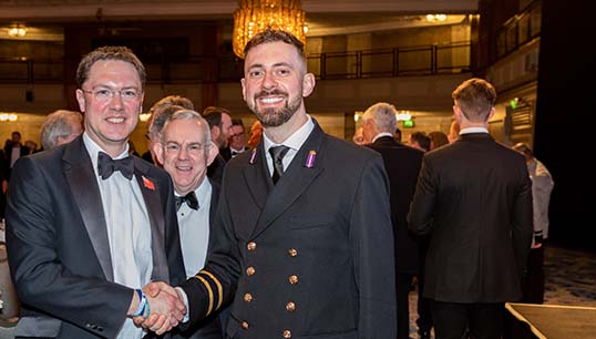 Image:2021's winner of the MCA Officer of the Year Award Gabriel Verne with maritime minister Robert Courts MP. Image: UK Chamber of Shipping