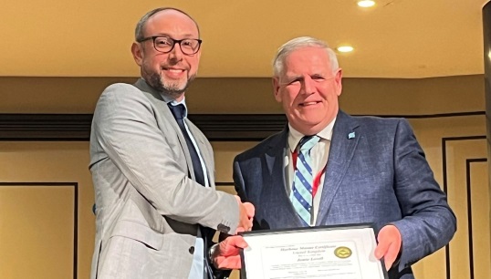 Image:Nautilus member Jamie Lovell (left) was presented with his Harbour Master Certificate by Captain John Lloyd at the UKHMA conference in London in November 2024. Image: courtesy of Jamie Lovell