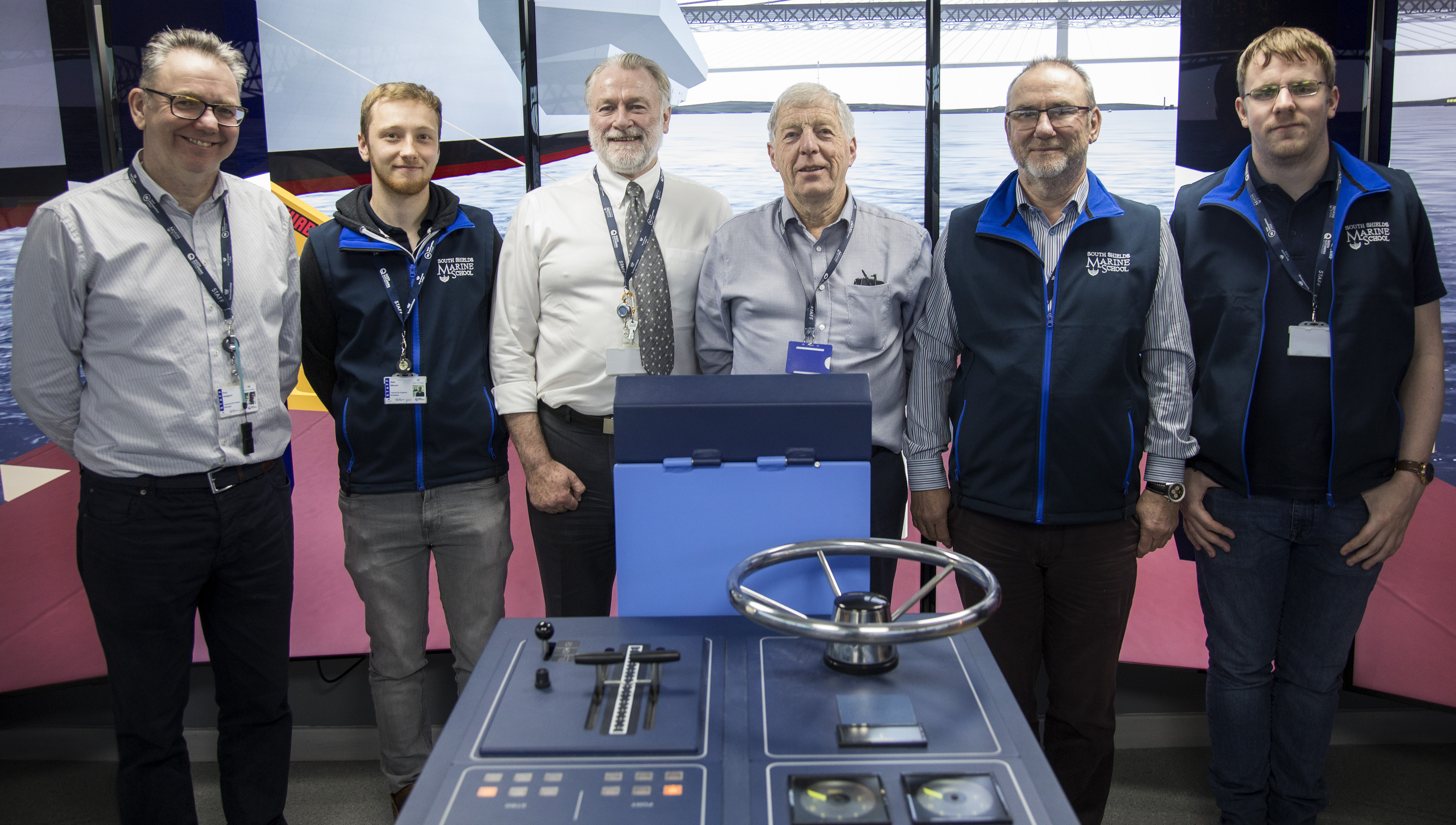 Image:Some of the  winning team in the Queen's anniversary prize: (from left) Paul Hodgson,                    technical and projects manager; Alan Mercer, 3D graphics modeller; Alan Peden,                       lecturer in projects team; Mel Irving, research, development, and advanced simulation manager; Jeremy Gough ,  head of School of Marine Simulation and Responsive Provision; Karl Shackleton, 3D graphics modeller. Image: South Shields.