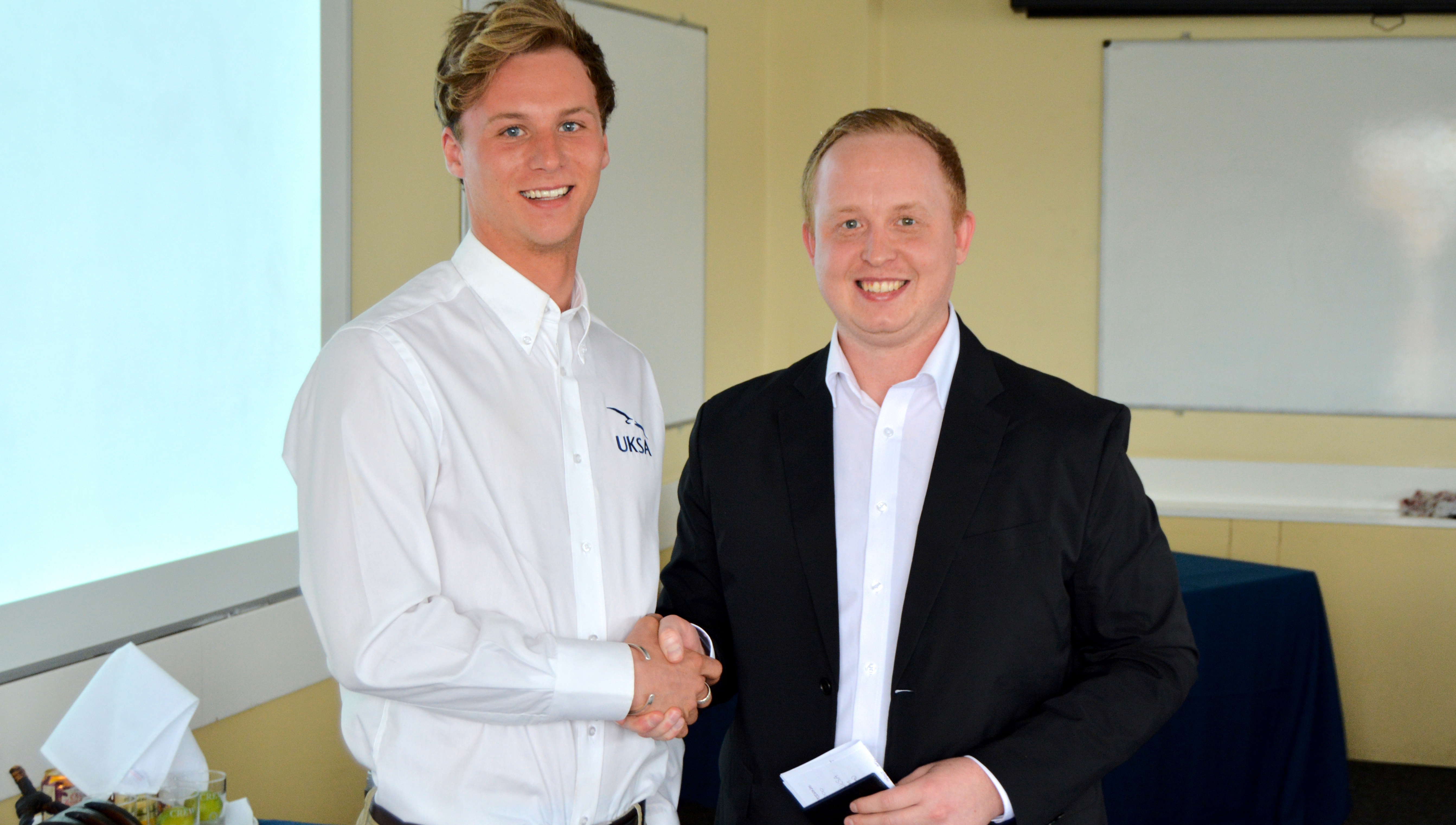 Image:Jean Paul Baudains, who is training at the UKSA facility in the Isle of Wight, is congratulated by Nautilus international organiser Danny McGowan. 