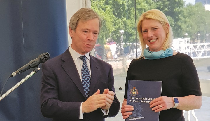 Image:Susie Thomson is presented with her Chartered Master Mariner award by Lord Mountevans, former Lord Mayor of the City of London.