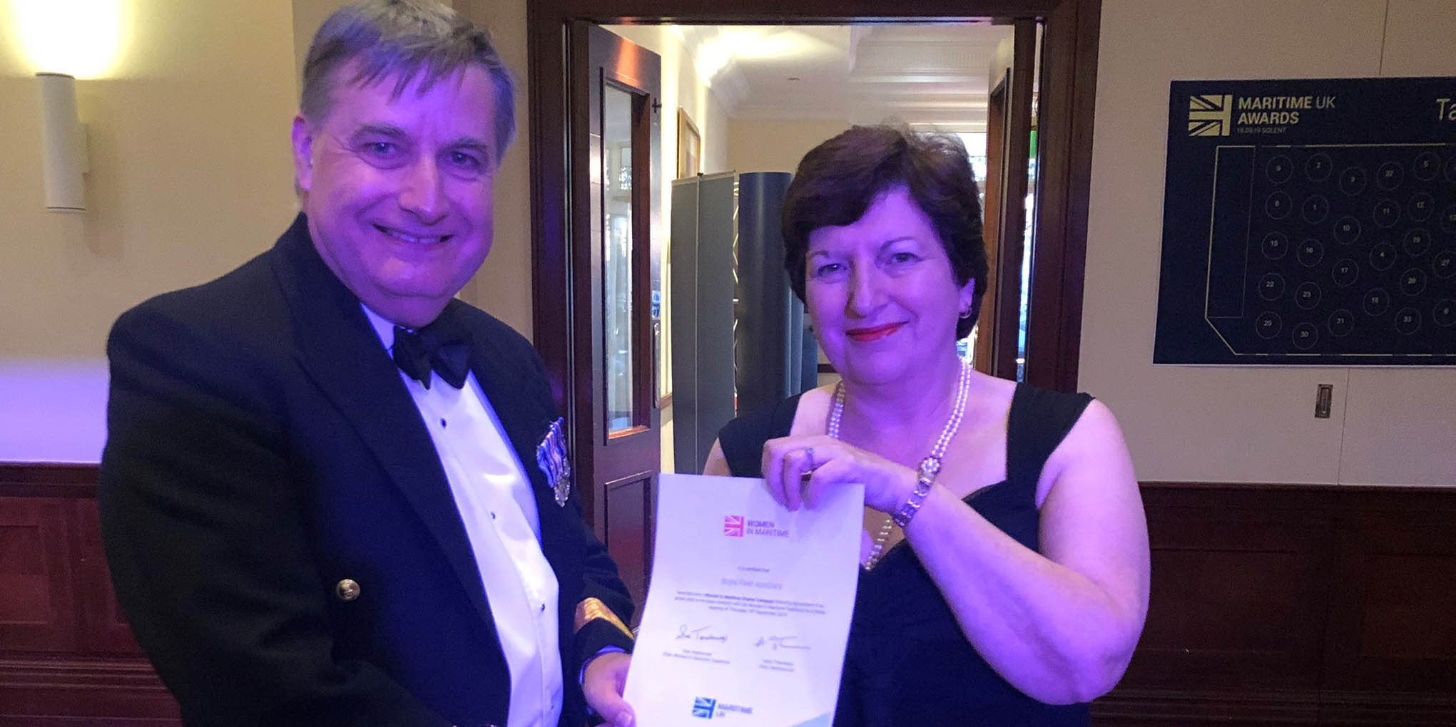 Image:RFA Commodore Duncan Lamb receives the Women in Maritime Charter from Women in Maritime Taskforce chair Sue Terpilowski