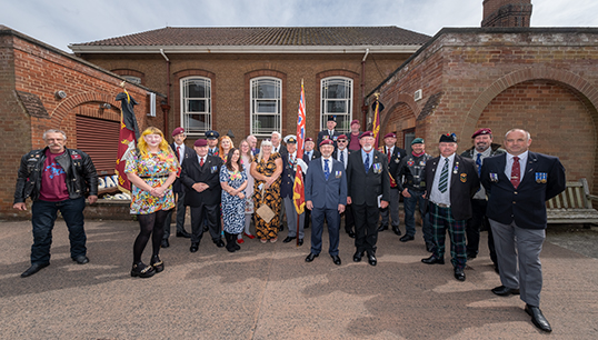 Image:Representatives of 2 Para Group 82, Airborne Riders and others with Wendy's father Roy Gibson, his sister Jeanette and his nieces Emma and Elizabeth at the crematorium after Wendy's finale Dancing Queen. Image: Jason Shipley