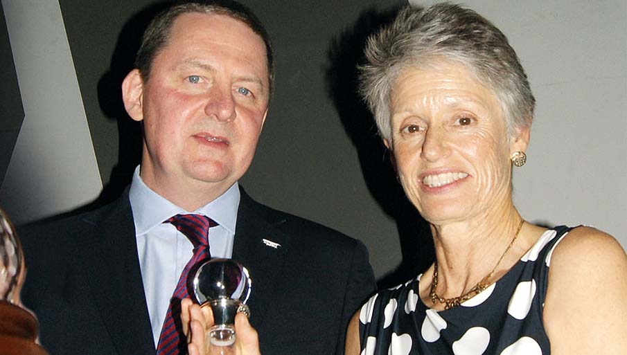 Image:Captain Barbara Campbell is presented with the Victoria Drummond Award by Nautilus general secretary Mark Dickinson.
