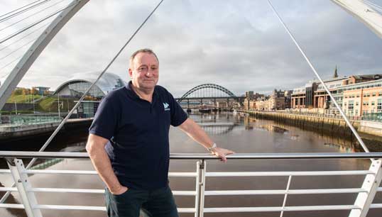Image:Captain Mike Nicholson's career has spanned from a ship's bridge to bridge design.  Image : The Gateshead Millennium Bridge, where he had some later input to the controversial bridge project when harbour master at the Port of Tyne. Credit:The Bigger Picture Agency