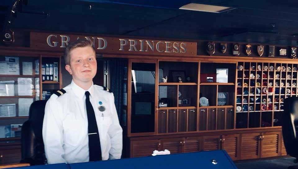 Image:Second Officer Jamie Edwards keeps busy in the 'brain centre' of each cruiseship