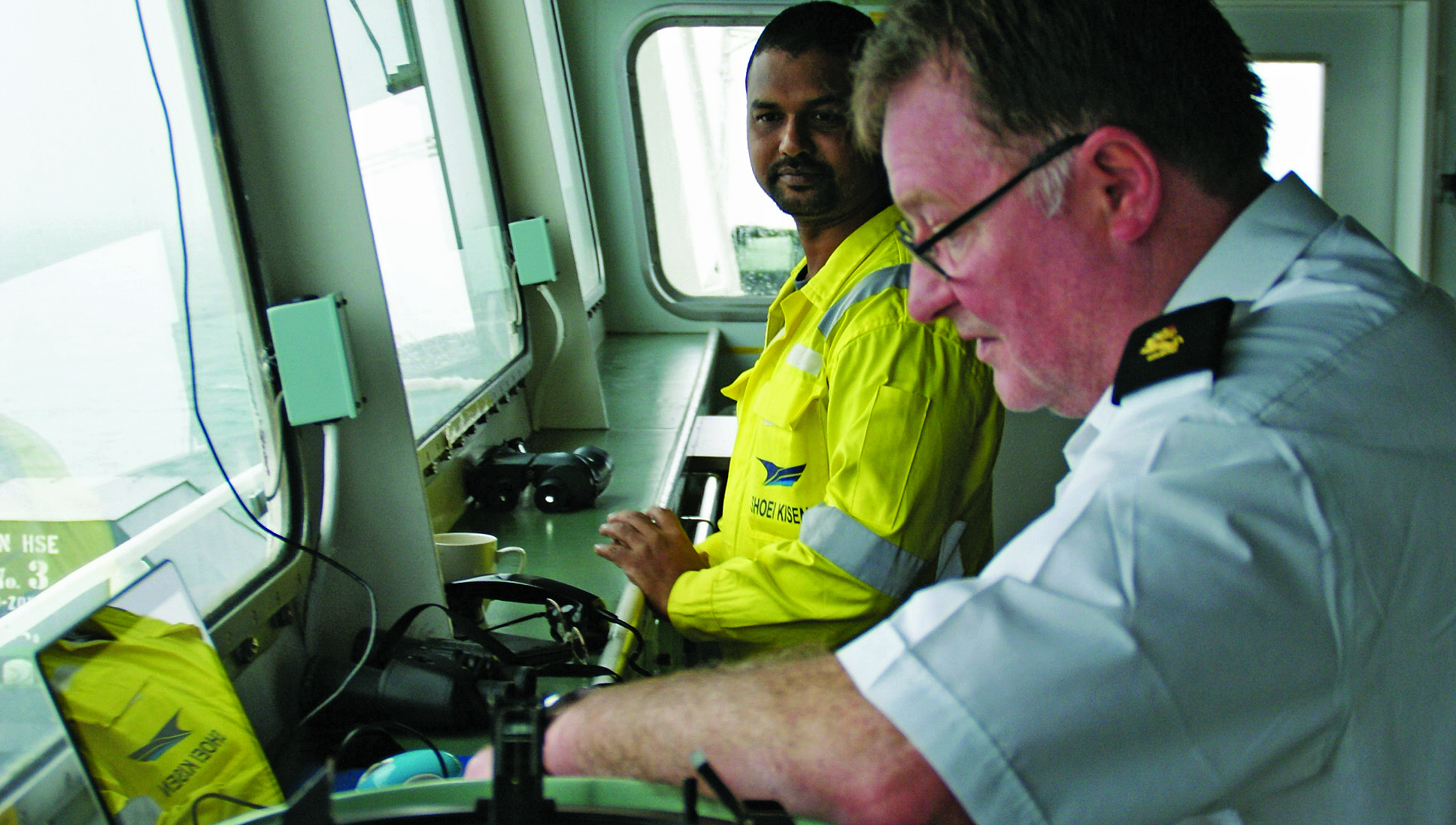 Image:Capt Lanaghan consults his personal pilot unit as the car carrier Cygnus Leader transits the Channel traffic separation scheme. All images: Andrew Linington