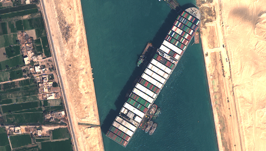 Image:An image from space of the Ever Given stuck in the Suez Canal. Image: Sentinel Hub/Wikimedia Commons