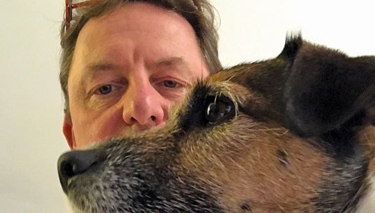Image:Nautilus general secretary Mark Dickinson and his dog Billie. Mr Dickinson has led Nautilus since 2009.