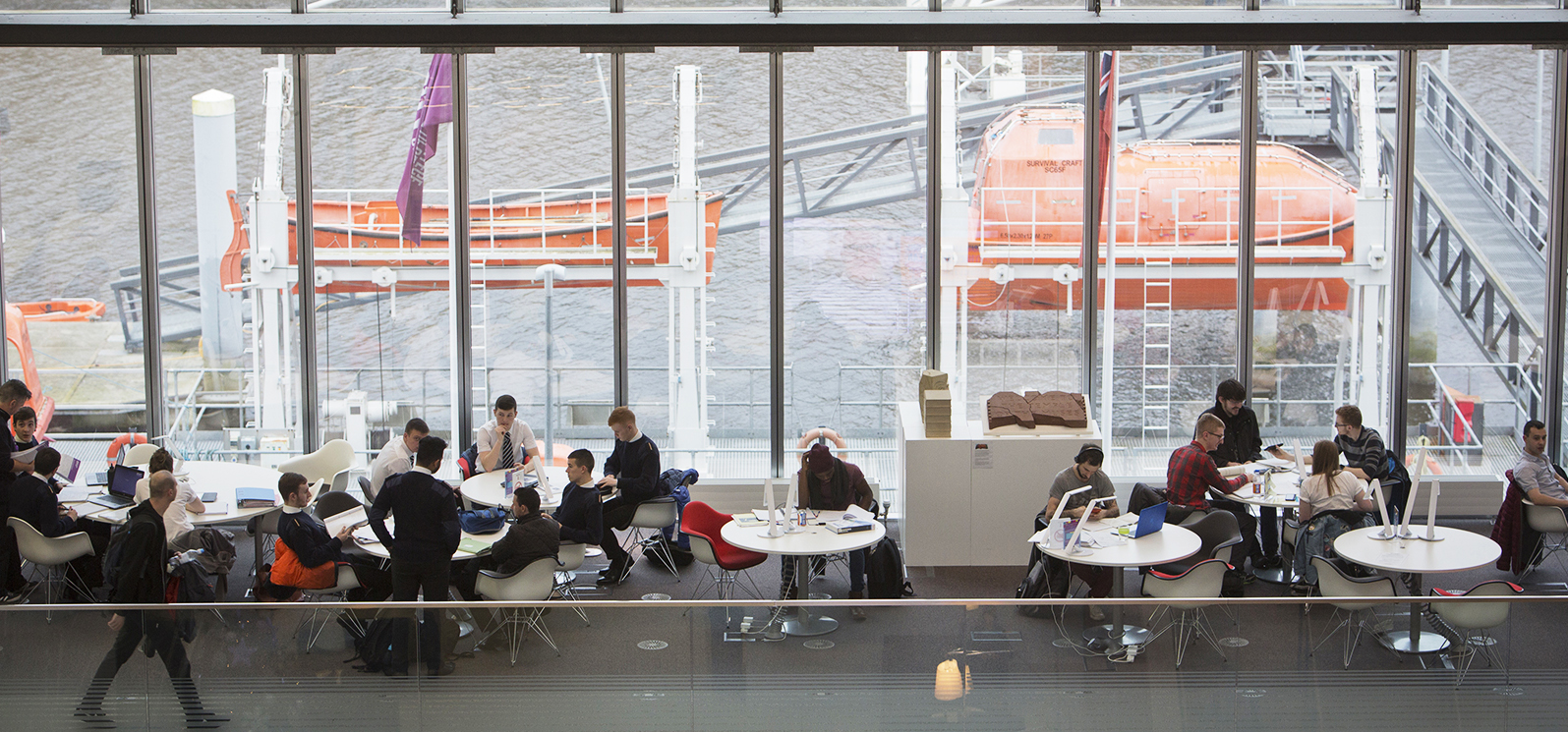 Image:Trainees take a break on the Glasgow riverside campus at the Faculty of Nautical Studies.