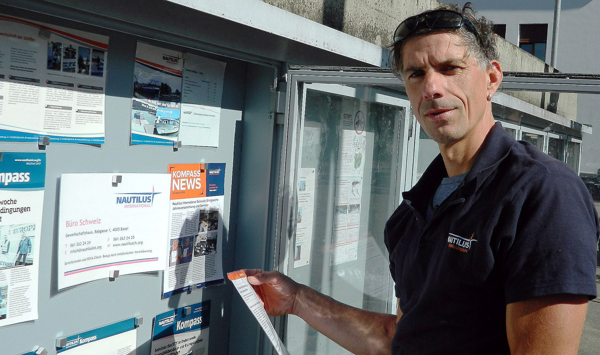 Image:Nautilus national secretary Holger Schatz posts the latest inland waterways news on the Union's noticeboard at the port.