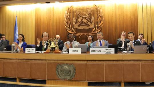 Image:IMO secretary general Kitack Lim joins the applause at MEPC 80 in July as the meeting adopts the 2023 IMO Strategy on Reduction of GHG Emissions from Ships. Image: IMO Flickr feed