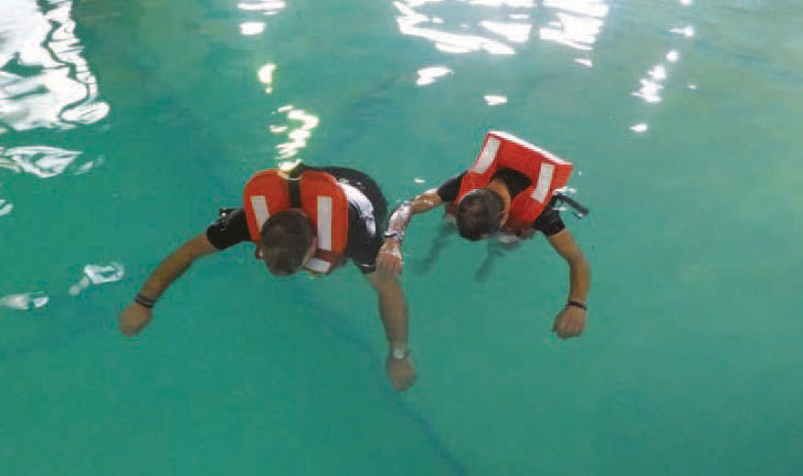 Image:MAIB tests found that some lifejackets fail to ensure that unconscious people are turned on their back so their airways are kept clear
