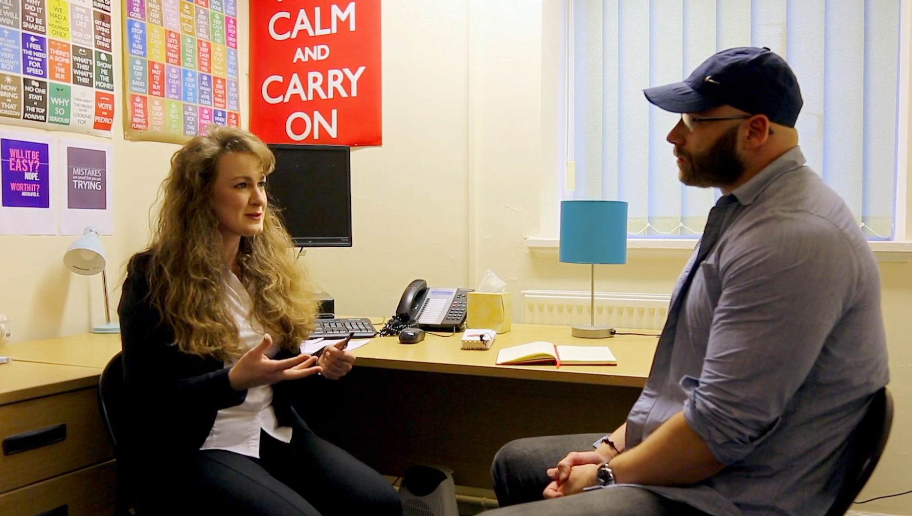 Image:Former deck rating turned lawyer Chaynee Hodgetts talks to a law student.