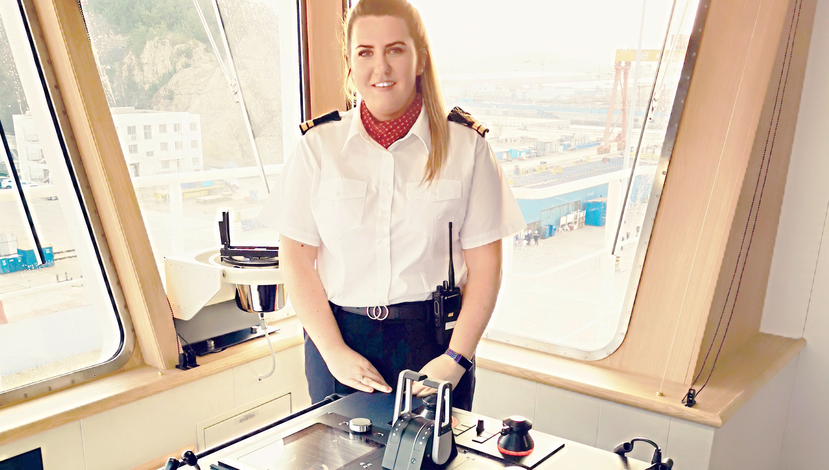 Image:Ferry sector second officer Cora Bonham at the bridge wing controls.