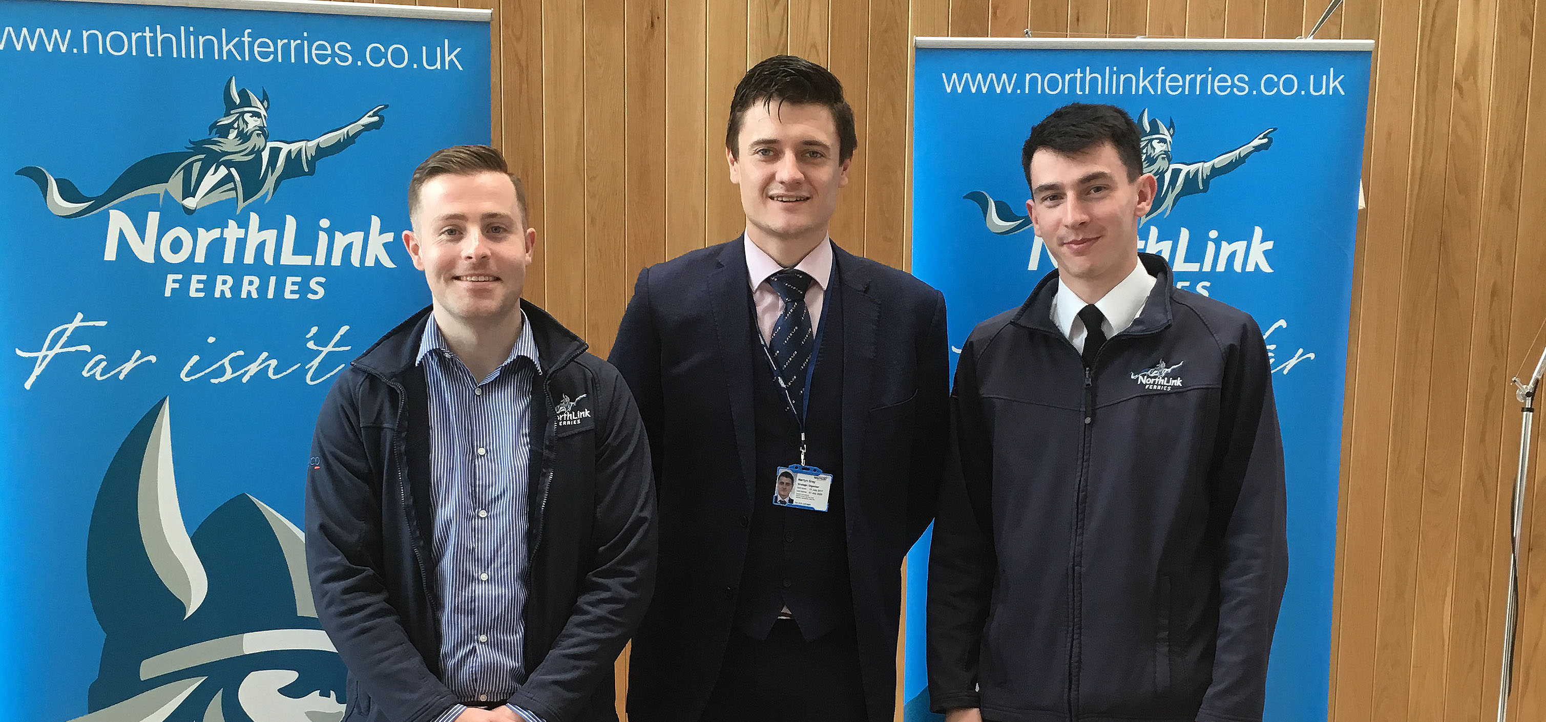 Image:Members Conor McGarry and Thomas O’Neill with Nautilus official Martyn Gray at the Northlink Ferries stand which also provided information and advice.