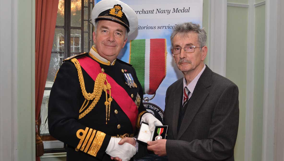 Image:Captain Dave Ramwell, right, receiving his Merchant Navy Medal in 2011  Image: www.stevedaszko.co.uk