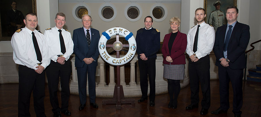 Image:The launch of the Royal Navy's Fastrack Maritime Scheme at Britannia Royal Naval College, Dartmouth. L-R: RN Lt Cdr Mike Garner; RN Merchant Navy liaison officer Lt Cdr David Carter; Trinity House director of maritime training Captain Nigel Hope; BRNC Dartmouth commanding officer Captain Jolyon Woodard; MNTB director Kathryn Neilson; Lt Thomas Stapley-Bunten; and Chiltern Maritime senior officer trainee coordinator Stuart Beng