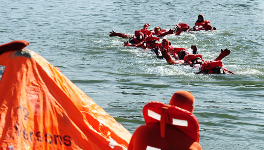 Image:A safety training drill at sea: the lack of safety training is particularly problematic in the superyacht sector. Image: Danny Cornelissen