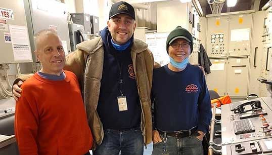 Image:Roland Rexha (middle) with Staten Island Ferry workers. Image: Marine Engineers' Beneficial Association 