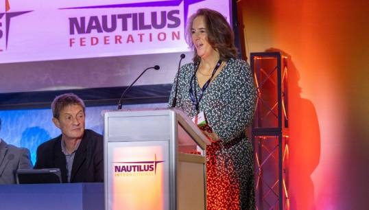 Image:Nautilus Council member Captain Jessica Tyson proposing the motion Charting a Just Transition for Maritime Professionals to the 2023 Nautilus International General Meeting. Image: Brad Wakefield
