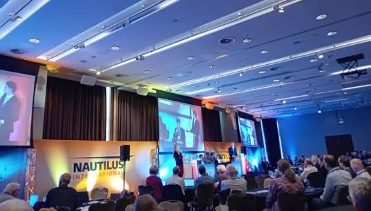 Image:Members at the 2023 Nautilus general meeting listen to a presentation by keynote speaker Martha Selwyn. Image: Nautilus International 