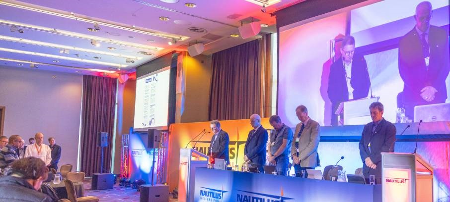 Image:At the beginning of the Union's General Meeting 2023, members held a moment of silence in memory of past Nautilus Council members, Trustees, officials, and Nautilus Federation members. Members can log into My Nautilus to download a pdf of the obituaries presented to the 2023 conference.