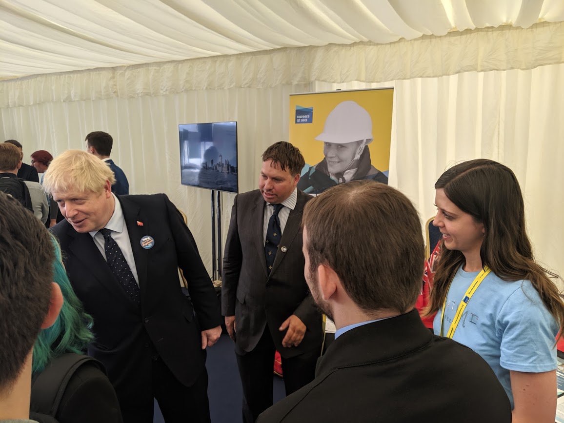 Image:Prime Minister Boris Johnson with MNTB training and careers manager Rachel Gurnett aboard the Pharos