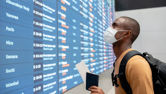 Image:Passengers should wear face masks while in airport terminals and during flights, and are also advised to have enough masks to last for the duration of their journey, since most masks will only give protection for four hours. Image Getty Images